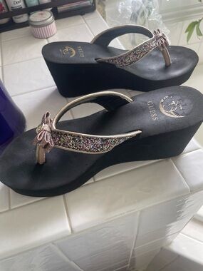 GUESS Black Wedge Flip Flops with Multicolor Glitter Straps